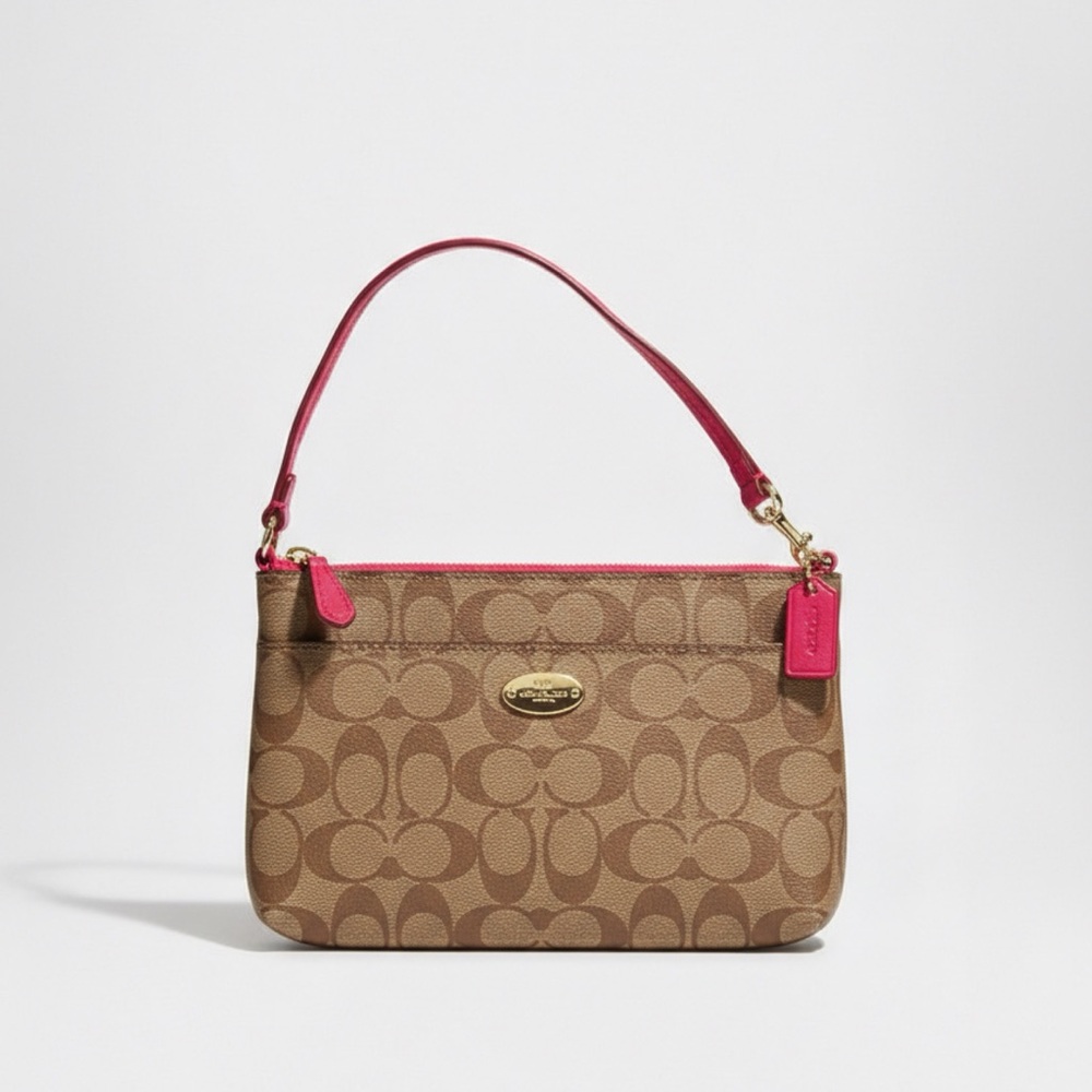 Coach signature brown and pink wristlet